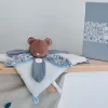 Doudou et Compagnie Doudou OURS bleu avec pétales - BOH'AIME -> Doudou Plat